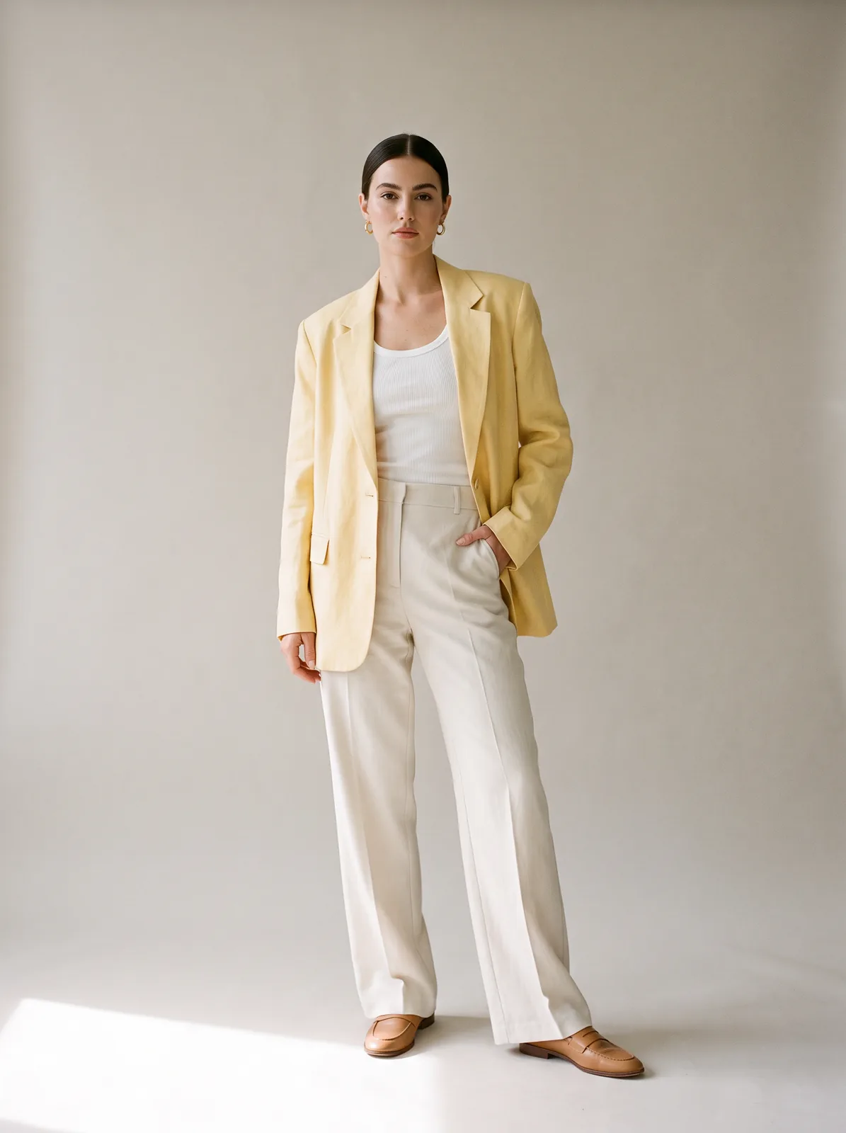 Yellow linen blazer look on an AI model: studio