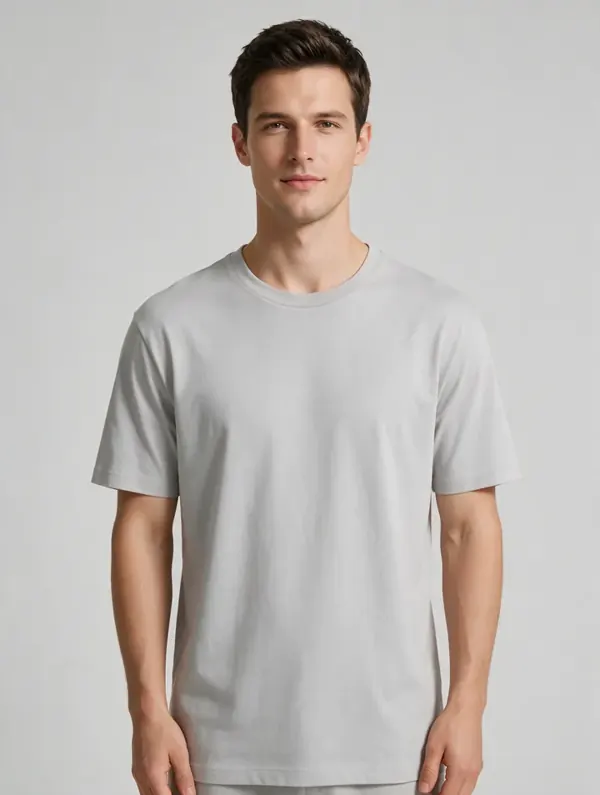 Man with short dark hair in a grey T-shirt: catalog AI model
