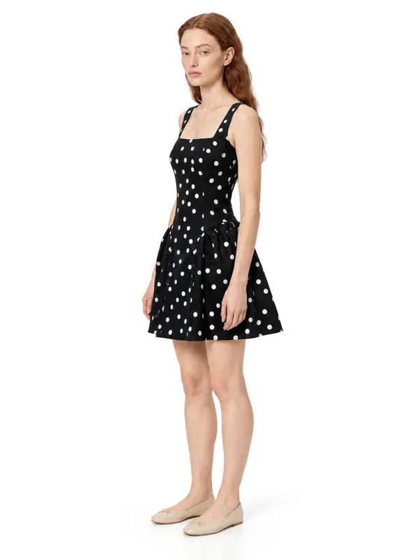 Polka dot dress on an AI model, three-quarter