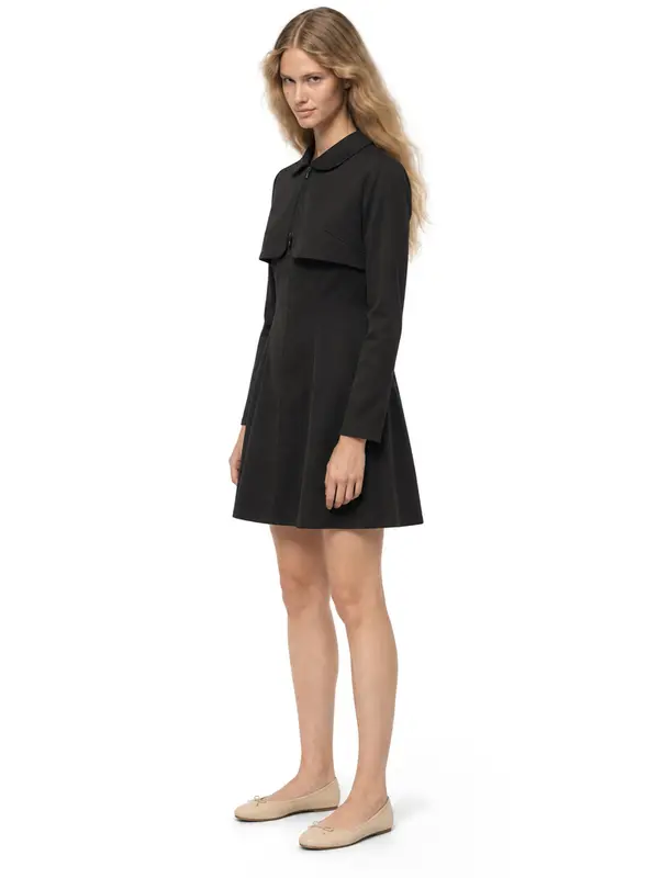 Black shirt dress on an AI model, white wall, three-quarter