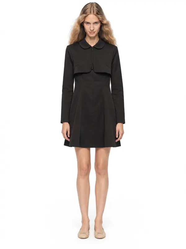 Black shirt dress on an AI model, white wall, front